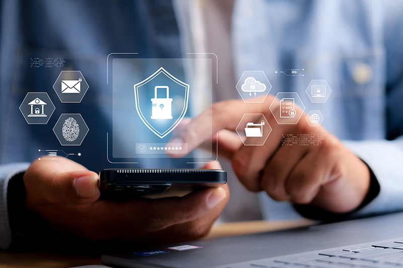 A person uses their phone to lock their accounts from fraud