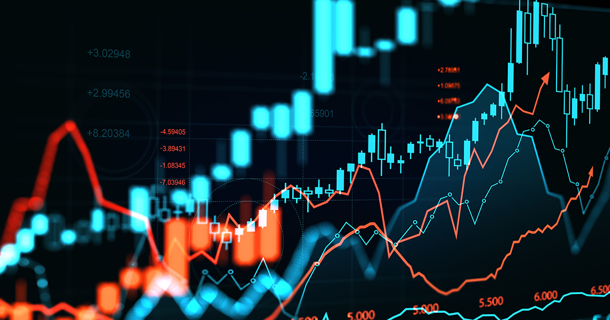 Blue and red graphs of the stock market layered on top of each other