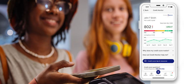 A young adult paying for a purchase with her debit card.