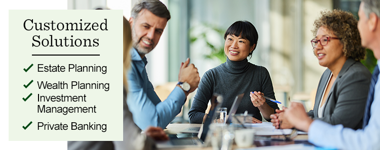 A team of people talking to each other in a meeting