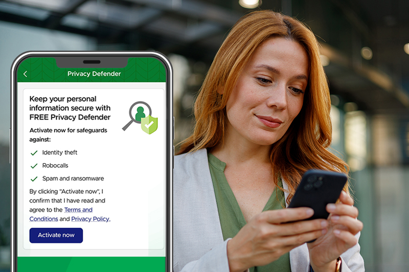 A woman looks at her phone